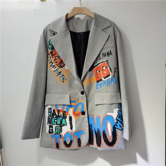 Blazer surdimensionné pour femmes avec une touche de modernité graphique