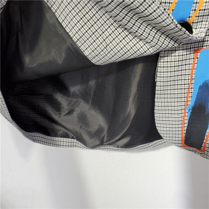 Blazer surdimensionné pour femmes avec une touche de modernité graphique